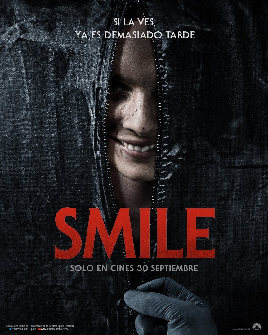 Cartel de Sonríe - España