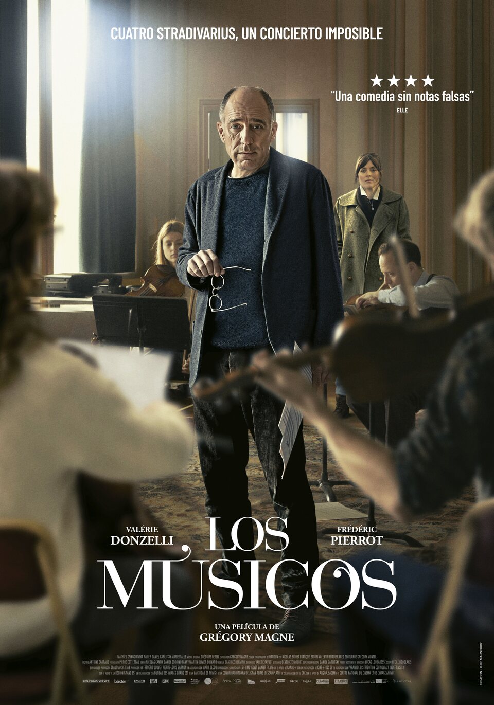 Cartel de Los músicos - España